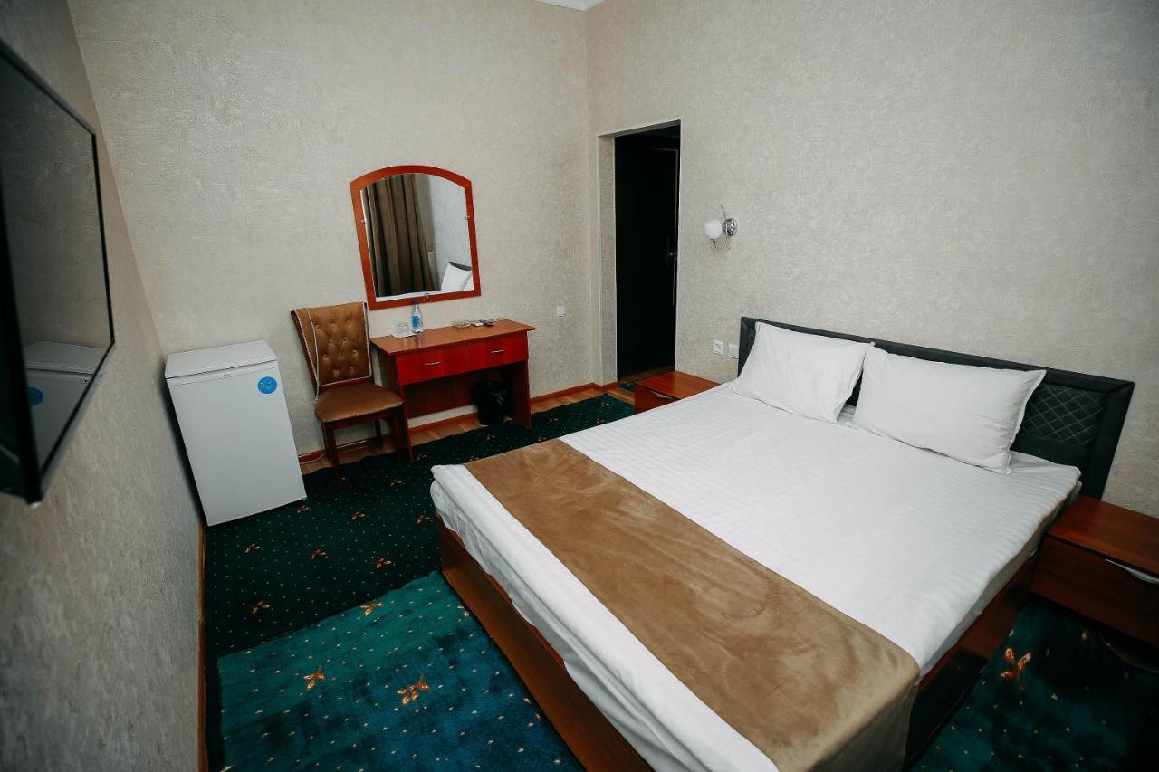 Fayz Hotel Yrgench Exterior foto