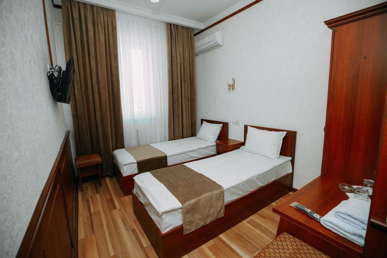 Fayz Hotel Yrgench Exterior foto